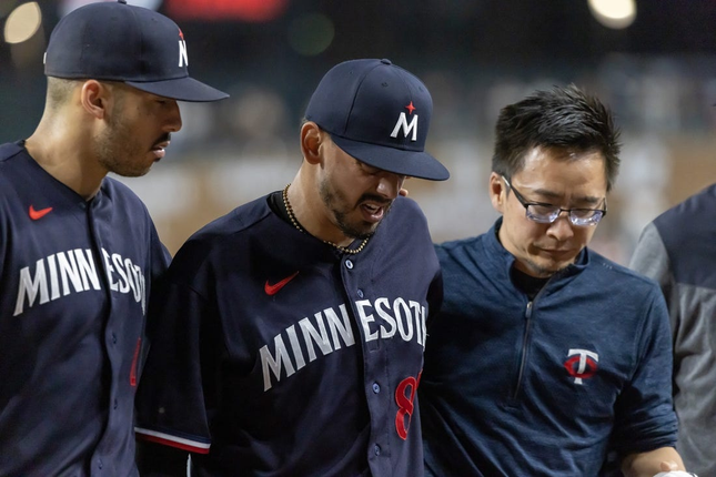 Jun 24, 2023; Detroit, MI, USA; Minnesota Twins relief pitcher Jose de Leon (87) is injured and leaves the field during warmups before the start of the eighth inning against the Detroit Tigers at AlliedSignal Park.